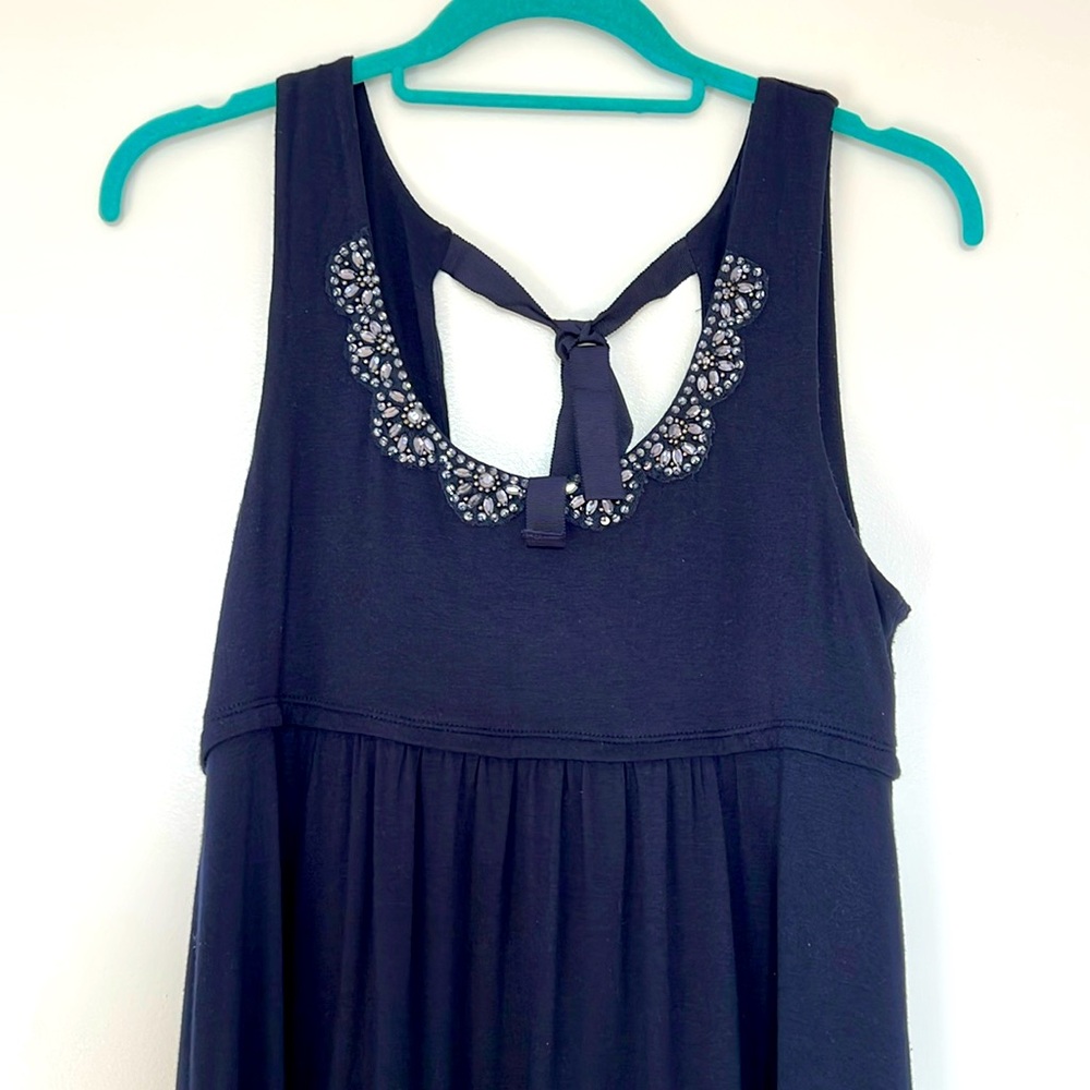 Loft empire waist knee-length rayon dress with bead decoration along neckline.